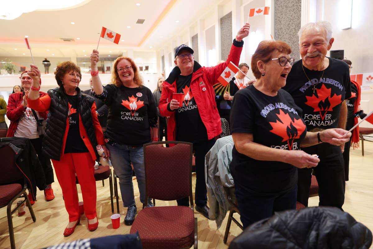Supporters wait for results at the pro-Canada watch party in Edmonton, Alberta Monday, Oct. 19, 2026.